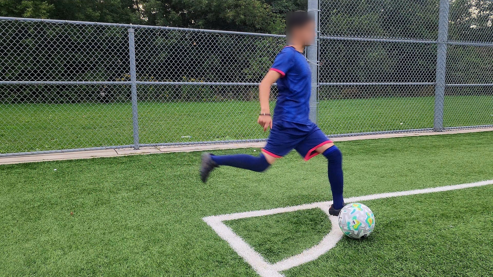 A participant playing soccer at Sports Ignite, October 2026